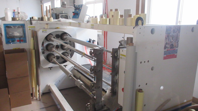 Adhesive tape cutting machine